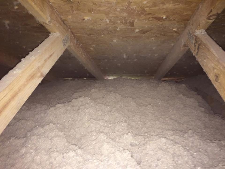 Blown-in insulation in an attic