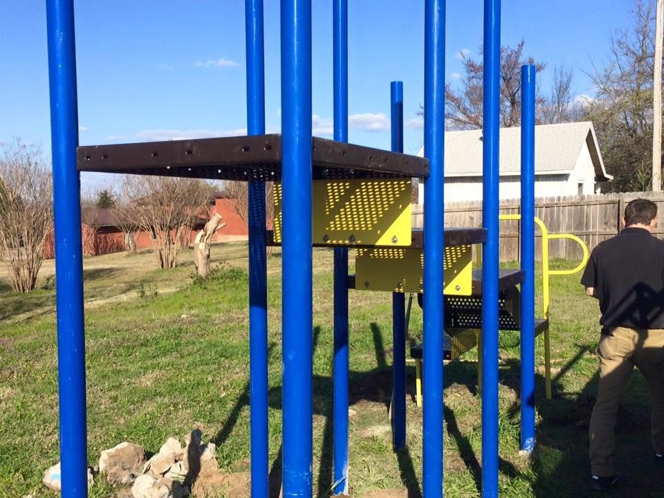 Playground platforms and steps being installed