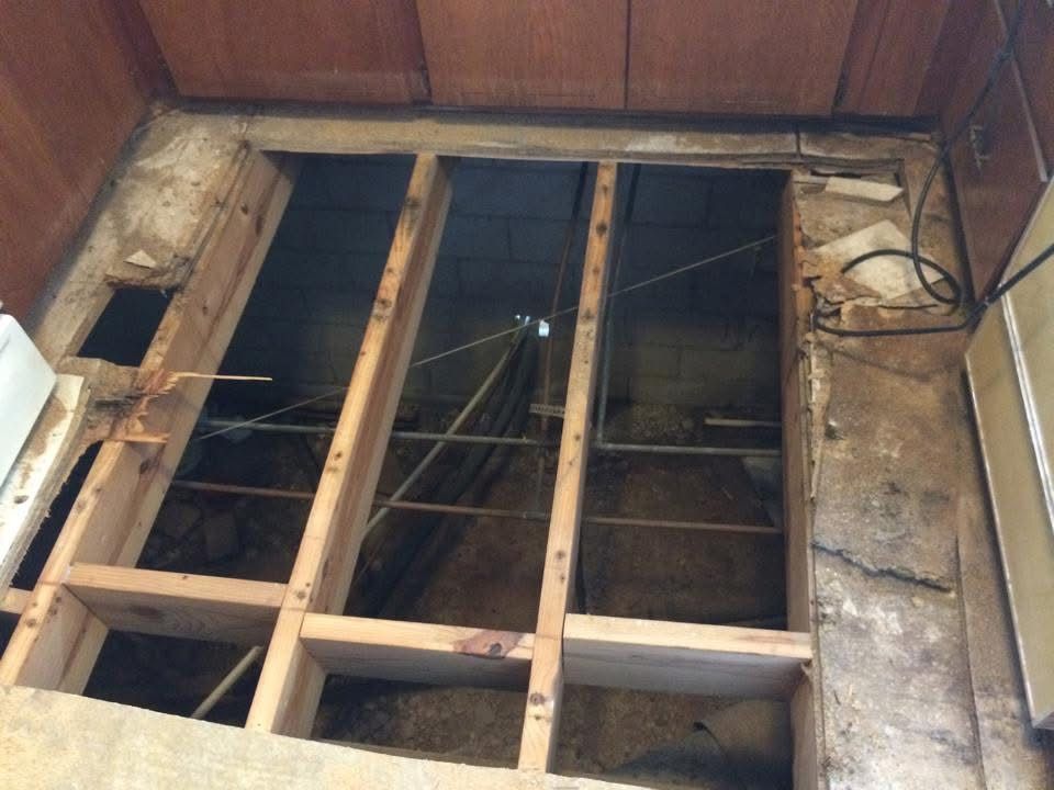 Kitchen floor opened up to new floor joists